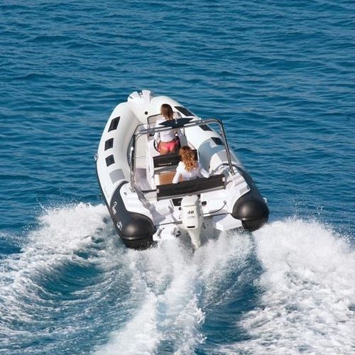 Надувная лодка c подвесным мотором - CAYMAN 19  - Ranieri International - полужесткая / с центральной консолью / открытая