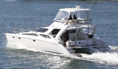 Быстроходный катер катамаран - V1270 Freedom - Voyager Catamarans - с внутренним мотором / с флайбриджем / для спортивной рыбалки