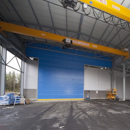 Дверь для судостроительной верфи - Crane  - Champion Door Oy  - вертикальная раздвижная / электрическая