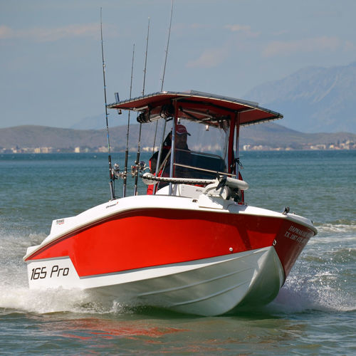 Открытый катер c подвесным мотором - 165Pro - Compass Boats - с центральной консолью / для спортивной рыбалки / макс. 6 человек